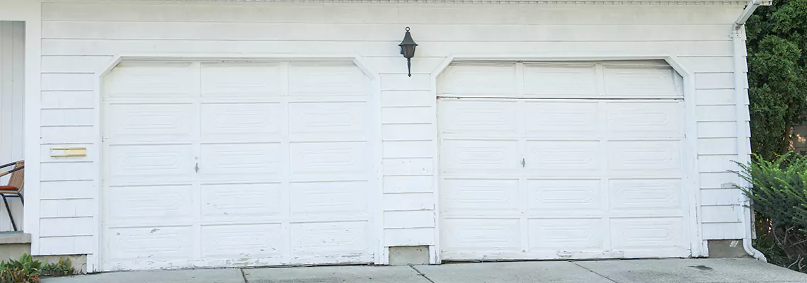 Roller Garage Door Dropped Down Replacement in University, FL