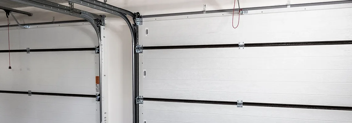 Fix Folding Garage Door Jerking in University, Florida